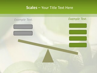 A Glass Filled With Green Liquid Next To Sliced Cucumbers PowerPoint Template