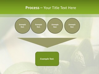 A Glass Filled With Green Liquid Next To Sliced Cucumbers PowerPoint Template