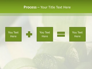 A Glass Filled With Green Liquid Next To Sliced Cucumbers PowerPoint Template