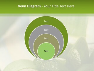 A Glass Filled With Green Liquid Next To Sliced Cucumbers PowerPoint Template