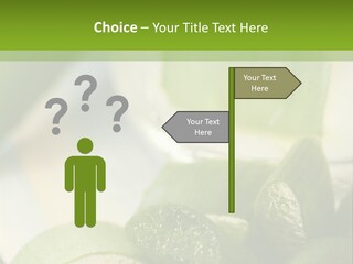 A Glass Filled With Green Liquid Next To Sliced Cucumbers PowerPoint Template