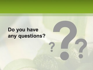 A Glass Filled With Green Liquid Next To Sliced Cucumbers PowerPoint Template