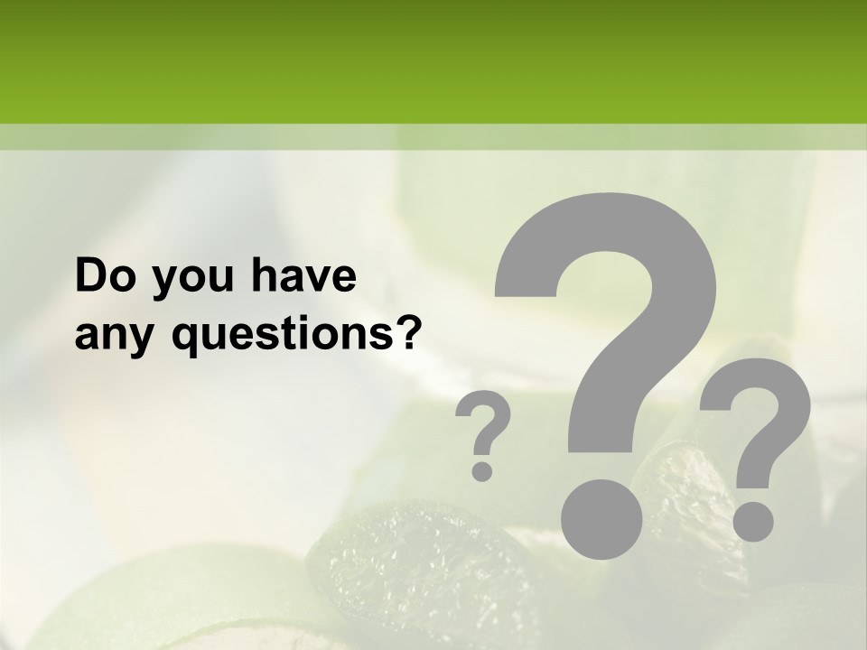 A Glass Filled With Green Liquid Next To Sliced Cucumbers PowerPoint Template