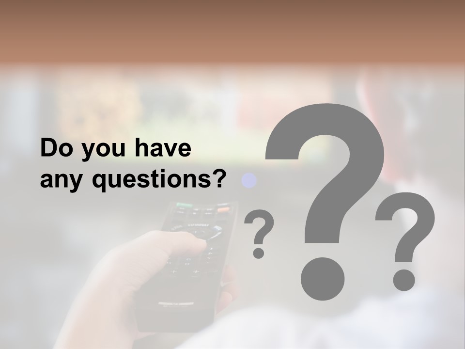 A Person Holding A Remote Control In Front Of A Television PowerPoint Template