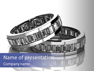 Two Wedding Rings With Diamonds On A Reflective Surface PowerPoint Template