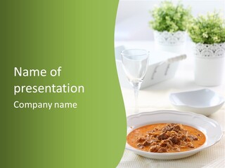 A Bowl Of Soup On A Table With A Glass Of Water PowerPoint Template