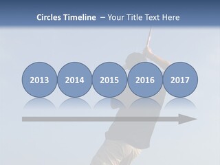 A Man On The Beach Holding A Fishing Rod PowerPoint Template