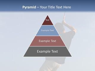 A Man On The Beach Holding A Fishing Rod PowerPoint Template