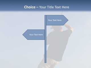 A Man On The Beach Holding A Fishing Rod PowerPoint Template