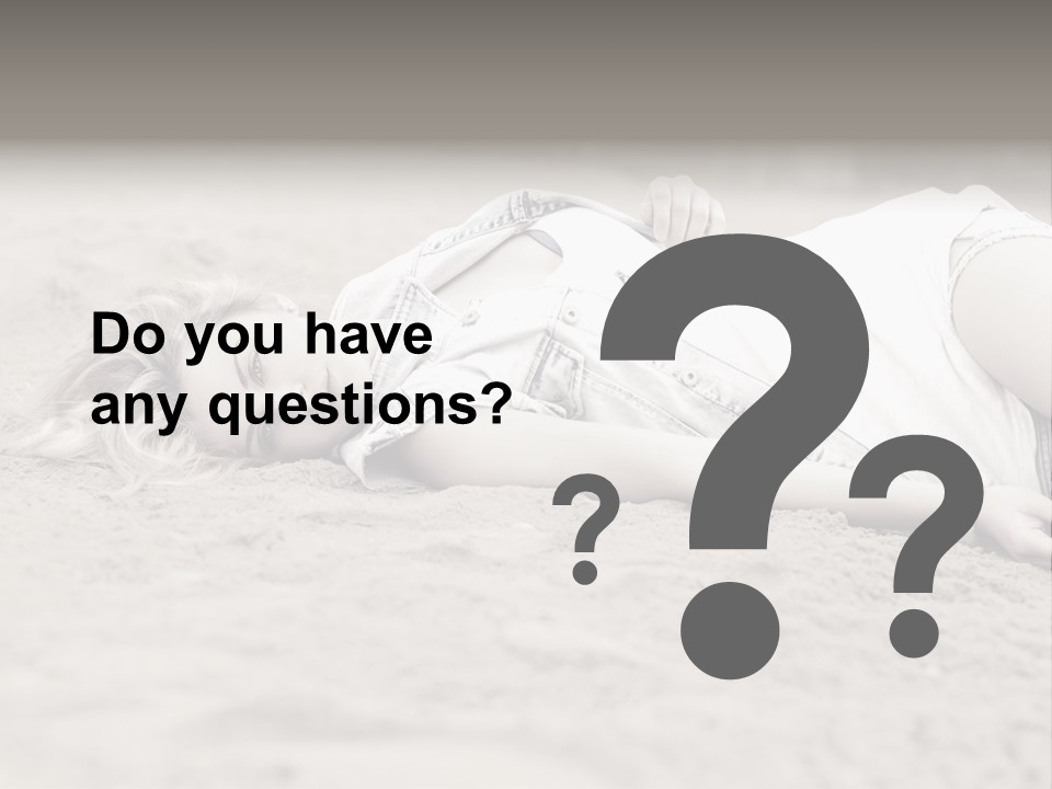 A Woman Laying In The Sand With Her Eyes Closed PowerPoint Template