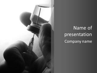 A Person Holding A Small Bottle With A Liquid In It PowerPoint Template