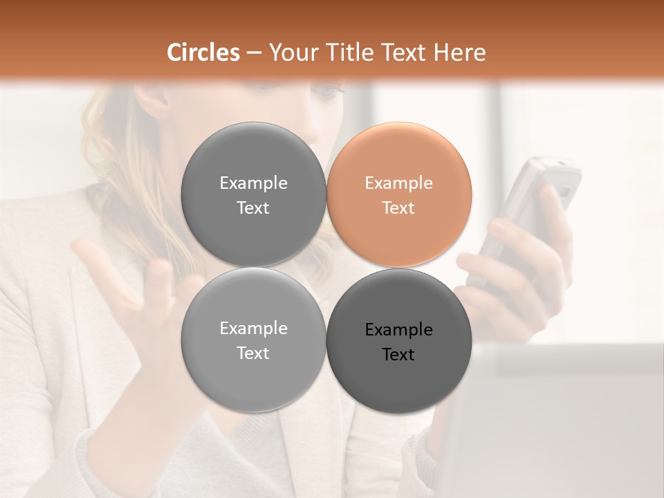 A Woman Sitting At A Table Using A Laptop Computer PowerPoint Template