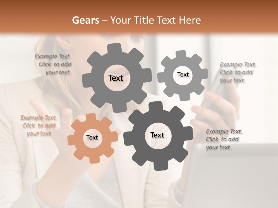 A Woman Sitting At A Table Using A Laptop Computer PowerPoint Template