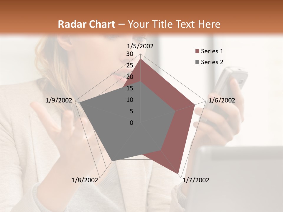 A Woman Sitting At A Table Using A Laptop Computer PowerPoint Template