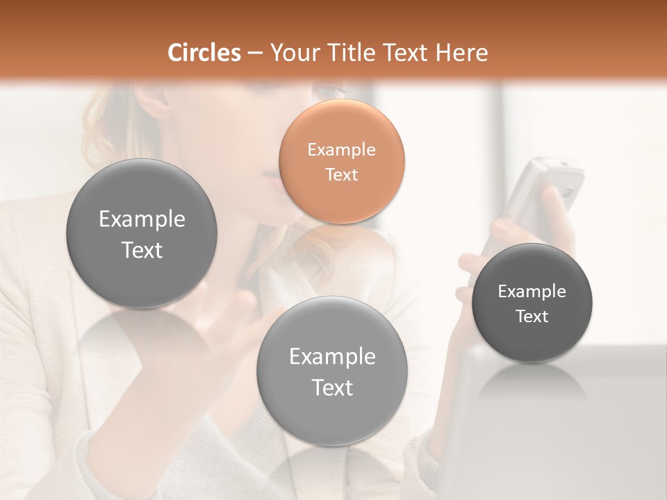 A Woman Sitting At A Table Using A Laptop Computer PowerPoint Template