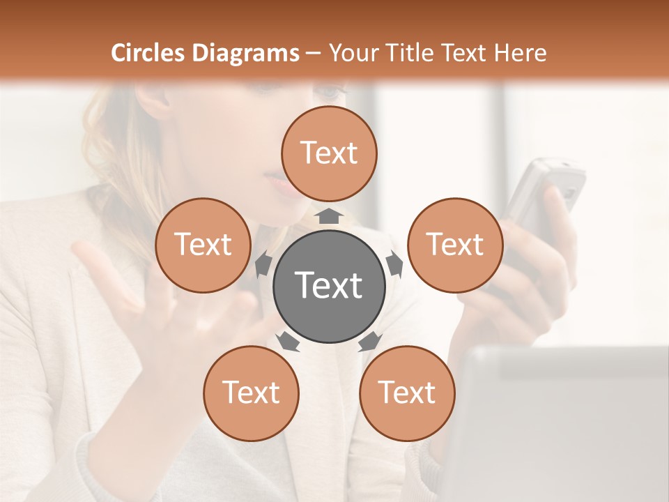 A Woman Sitting At A Table Using A Laptop Computer PowerPoint Template