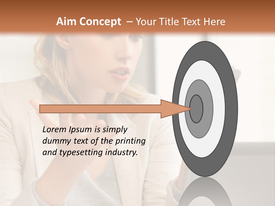 A Woman Sitting At A Table Using A Laptop Computer PowerPoint Template