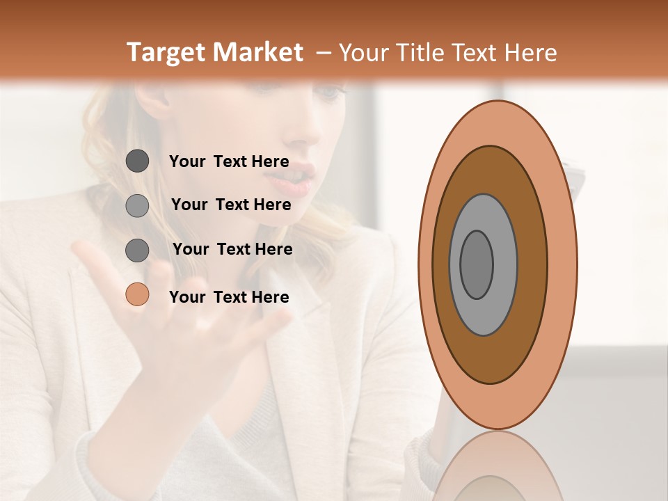 A Woman Sitting At A Table Using A Laptop Computer PowerPoint Template