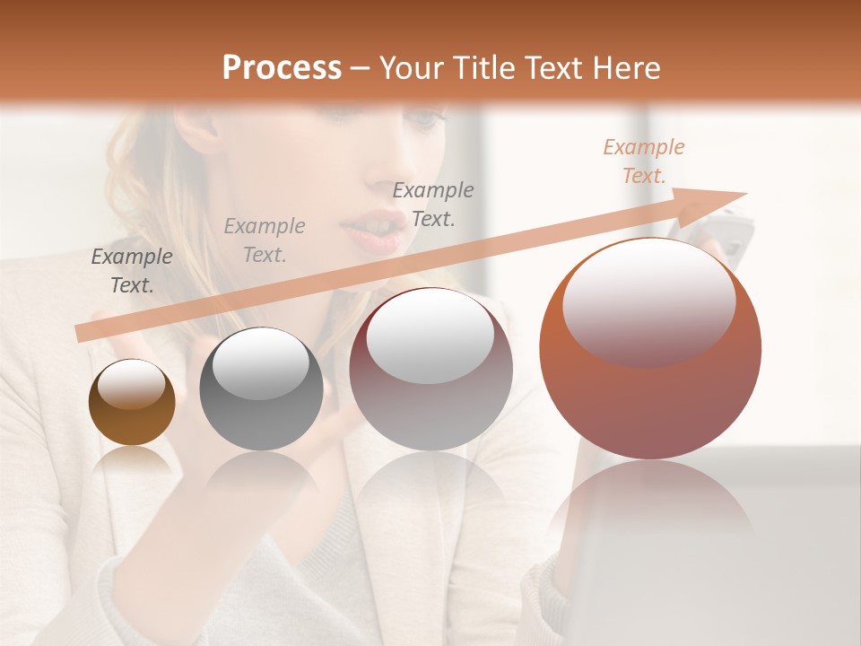 A Woman Sitting At A Table Using A Laptop Computer PowerPoint Template