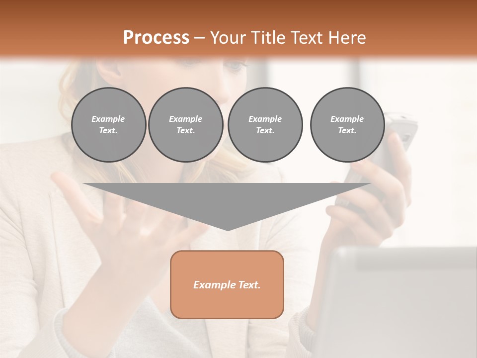 A Woman Sitting At A Table Using A Laptop Computer PowerPoint Template