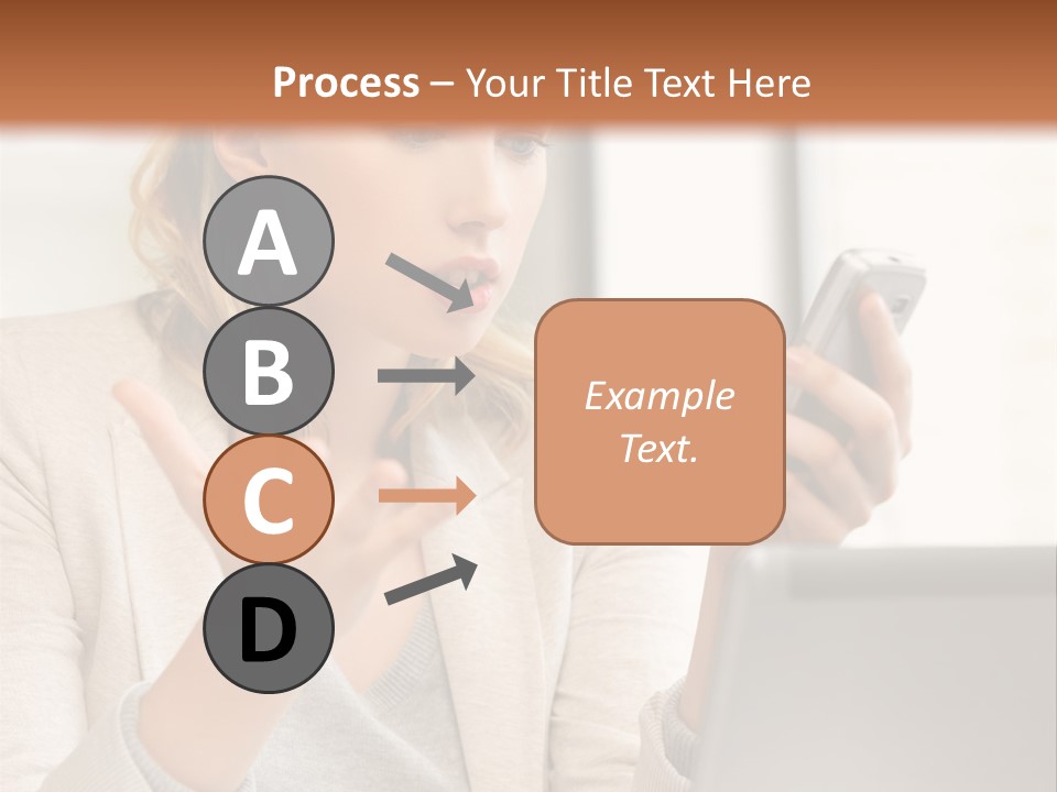 A Woman Sitting At A Table Using A Laptop Computer PowerPoint Template
