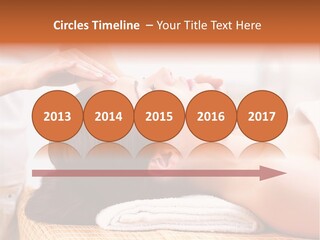 A Woman Getting A Facial Massage At A Spa PowerPoint Template