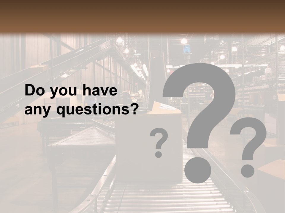 A Conveyor Belt In A Large Warehouse PowerPoint Template