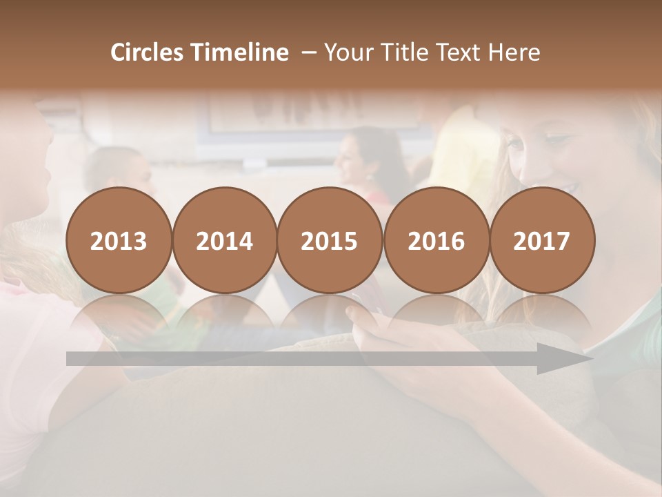 A Woman Sitting On A Couch Looking At A Cell Phone PowerPoint Template