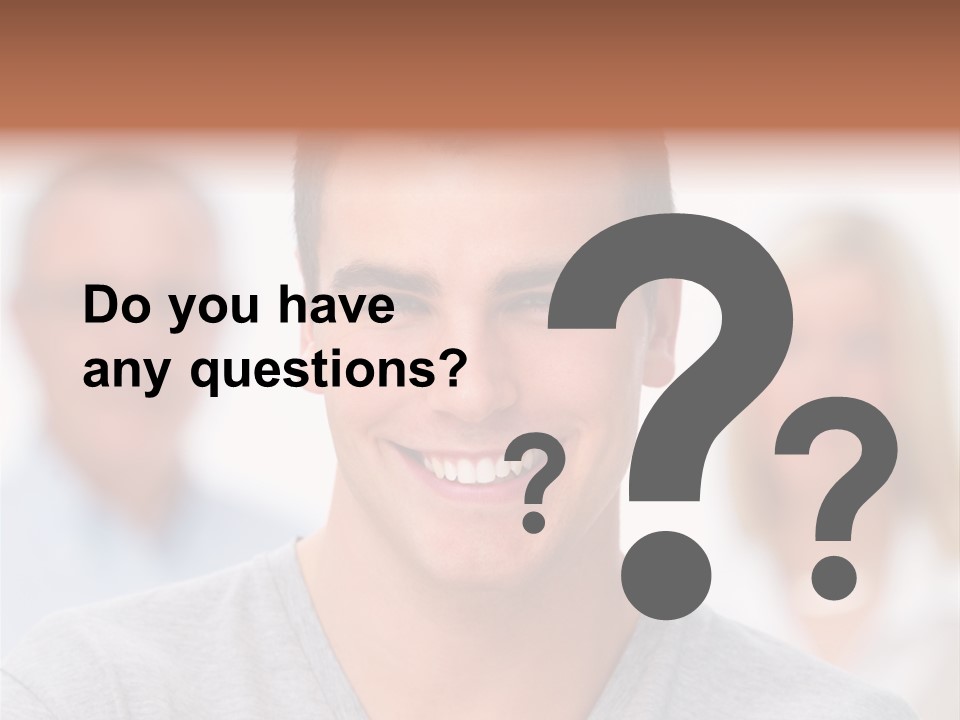 A Man Smiling With A Group Of People Behind Him PowerPoint Template