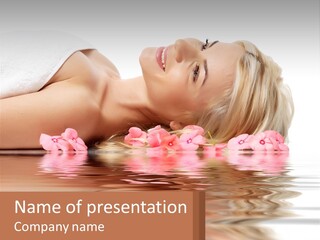 A Woman Laying On The Water With Pink Flowers PowerPoint Template