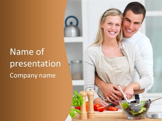 A Man And Woman Cutting Vegetables On A Cutting Board PowerPoint Template