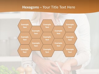 A Man And Woman Cutting Vegetables On A Cutting Board PowerPoint Template