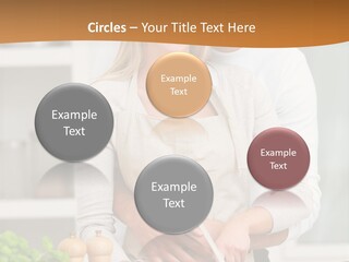 A Man And Woman Cutting Vegetables On A Cutting Board PowerPoint Template