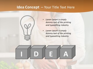 A Man And Woman Cutting Vegetables On A Cutting Board PowerPoint Template