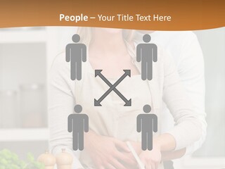 A Man And Woman Cutting Vegetables On A Cutting Board PowerPoint Template