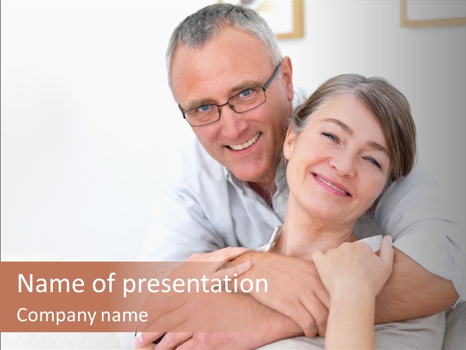 A Man And Woman Hugging Each Other On A Bed PowerPoint Template