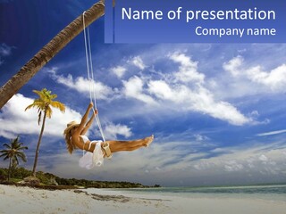 A Woman Swinging On A Rope On The Beach PowerPoint Template