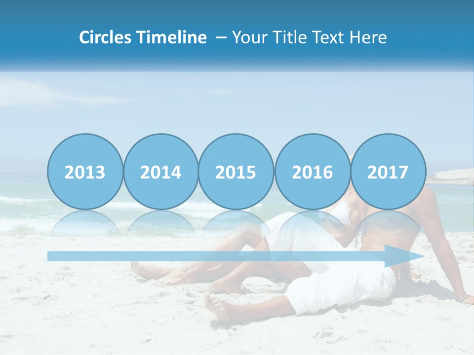 A Man And Woman Sitting On The Beach With The Ocean In The Background PowerPoint Template