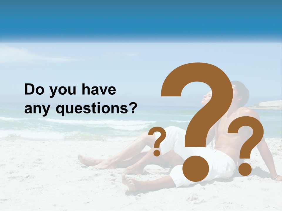 A Man And Woman Sitting On The Beach With The Ocean In The Background PowerPoint Template