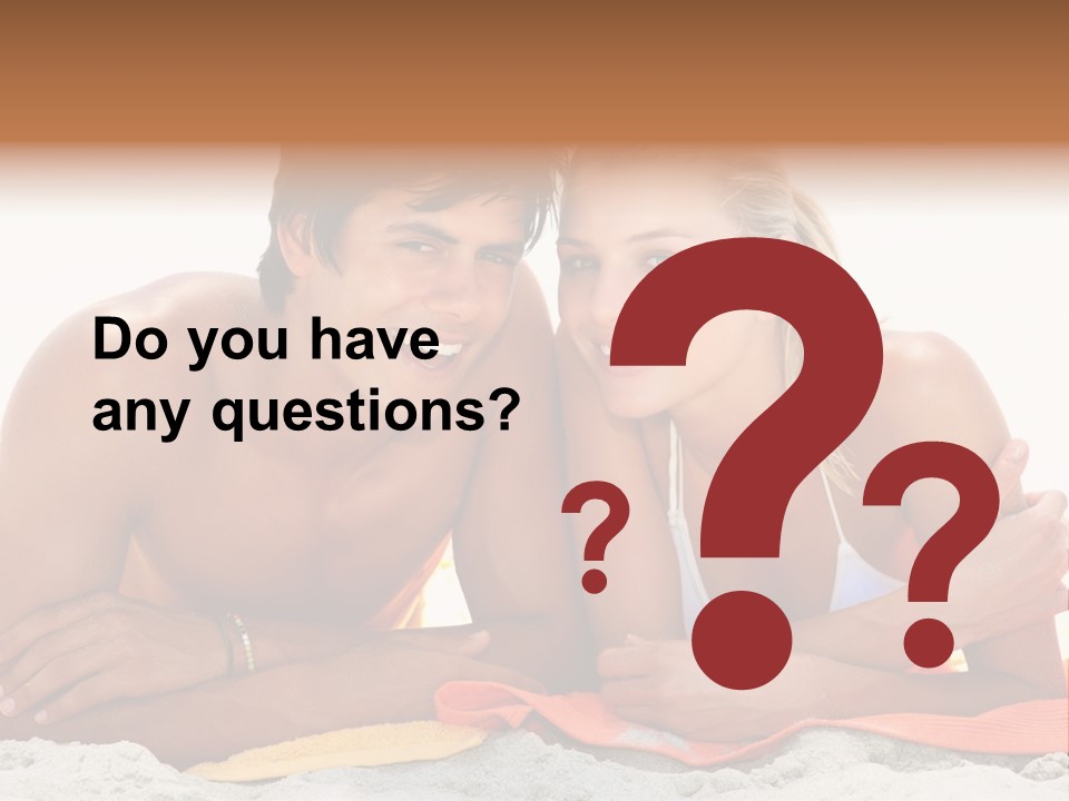 A Man And A Woman Laying On The Beach PowerPoint Template