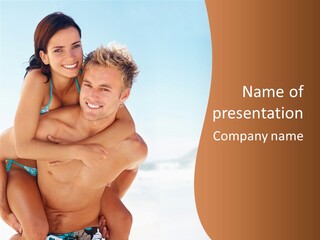 A Man Holding A Woman In His Arms On The Beach PowerPoint Template