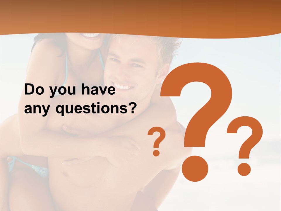 A Man Holding A Woman In His Arms On The Beach PowerPoint Template