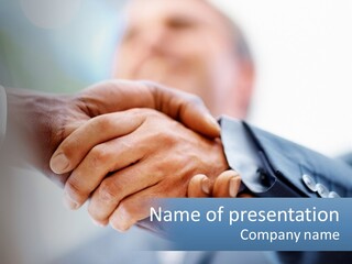 Two People Shaking Hands Over A Piece Of Paper PowerPoint Template