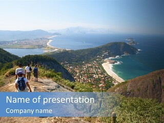 A Group Of People Standing On Top Of A Mountain PowerPoint Template