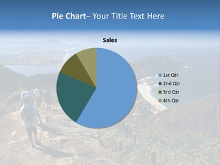 A Group Of People Standing On Top Of A Mountain PowerPoint Template