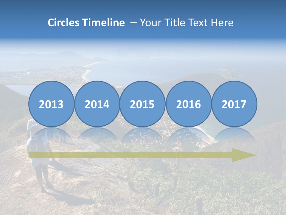 A Group Of People Standing On Top Of A Mountain PowerPoint Template