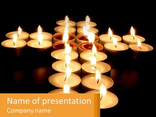 Many Lit Candles Are Arranged In The Shape Of A Cross PowerPoint Template