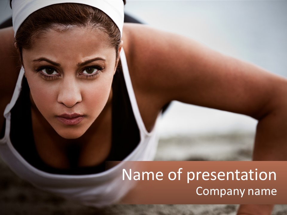 A Woman Is Doing Push Ups On The Beach PowerPoint Template
