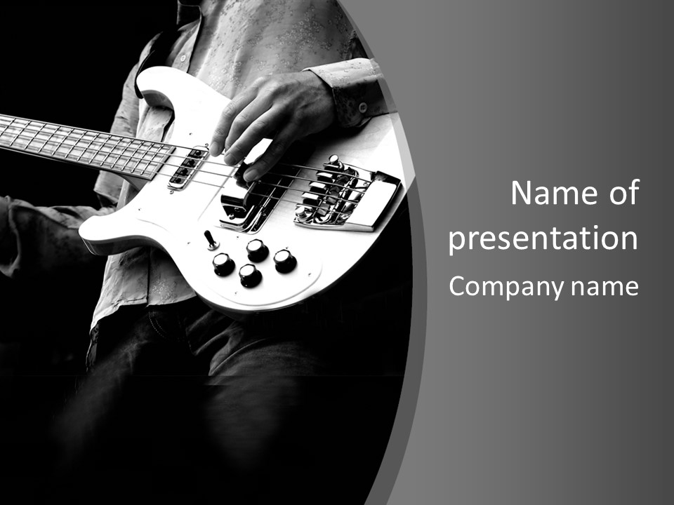 A Black And White Photo Of A Man Playing A Bass Guitar PowerPoint Template