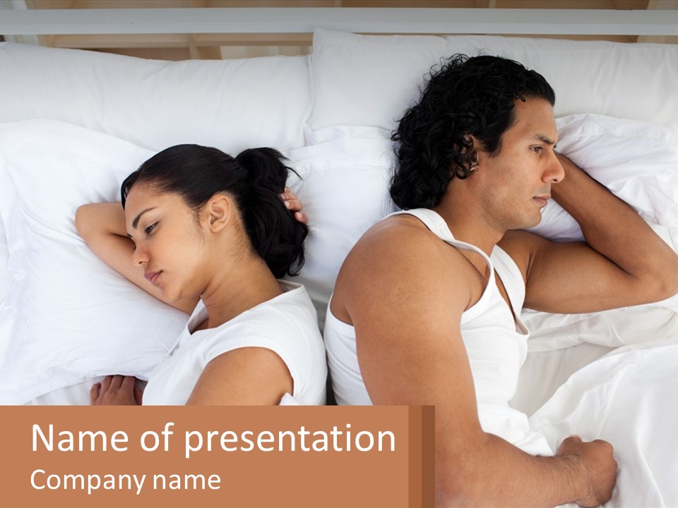A Man And A Woman Sleeping In Bed Together PowerPoint Template